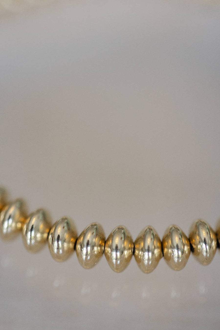 Coast and Cove - 6mm gold disc bracelet